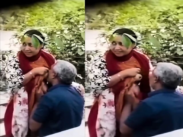 Uncle sucking aunty boobs while walking in park